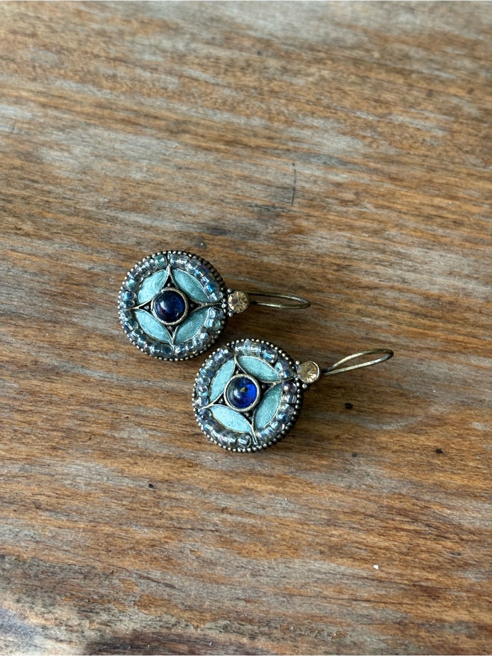 VTG Avon earrings feature a bohemian style with a round design